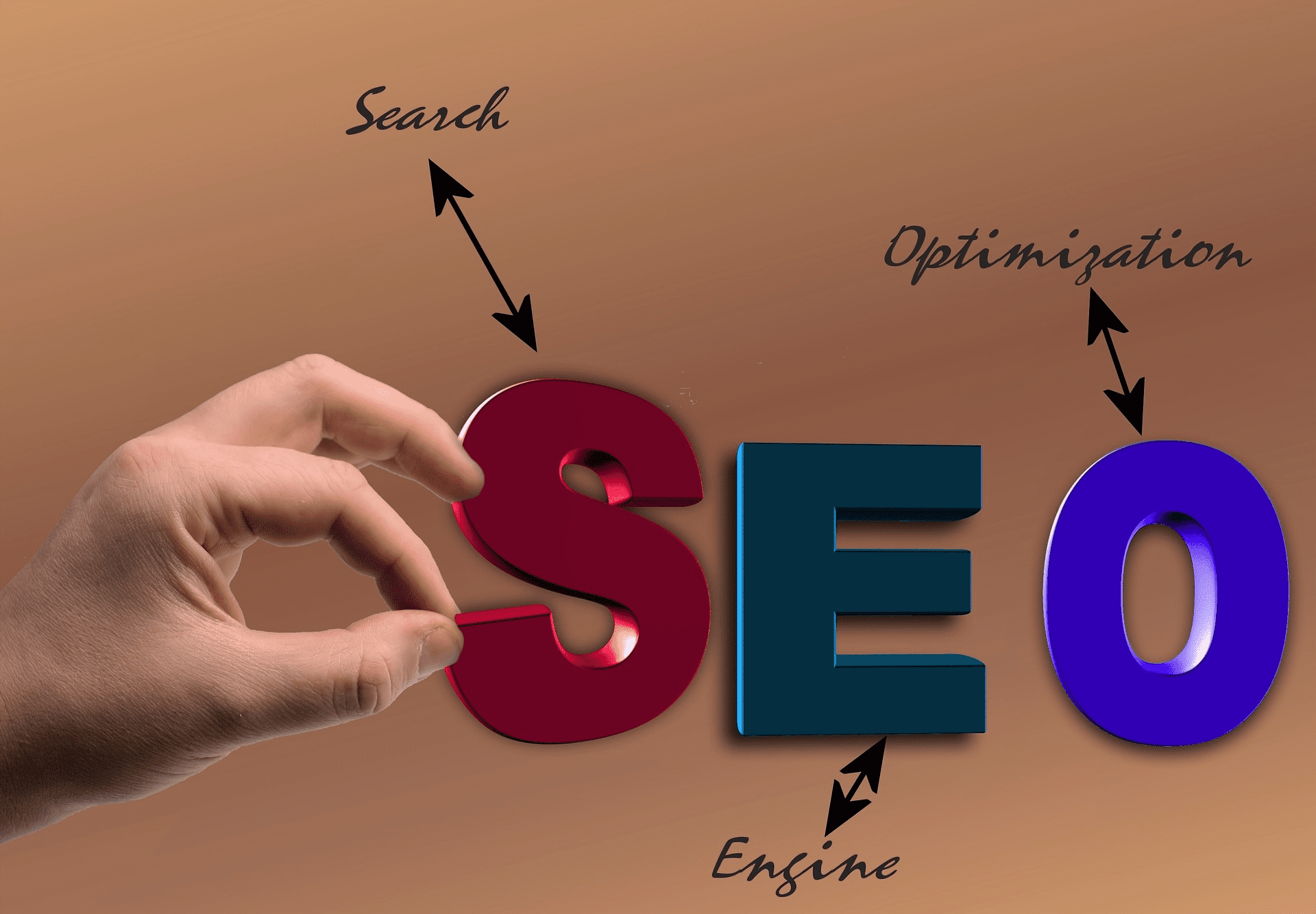 Graphic with Fingers holding SEO.